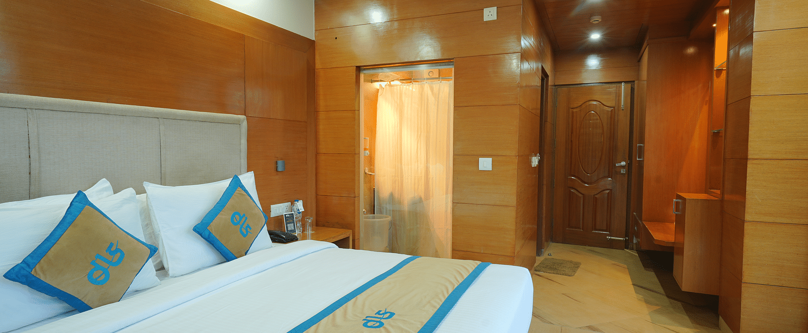 Image of a room taken from the bedside showing the entrance at DLS Hotels The Rock Castle.